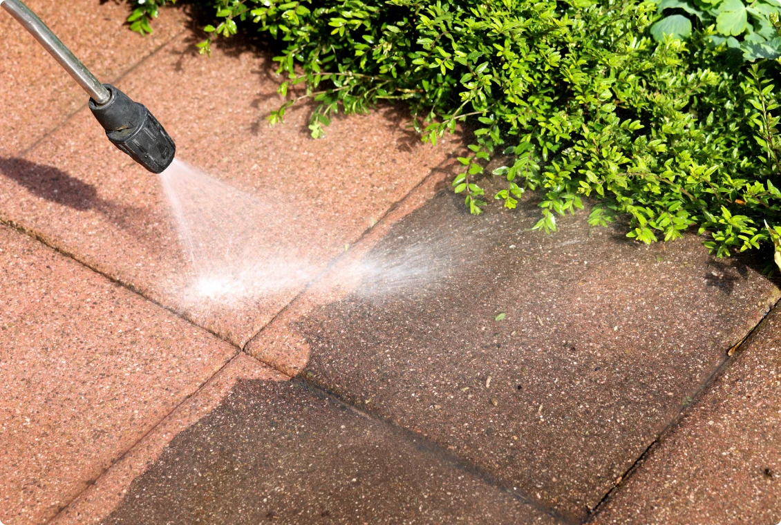 Pressure washing patio tiles